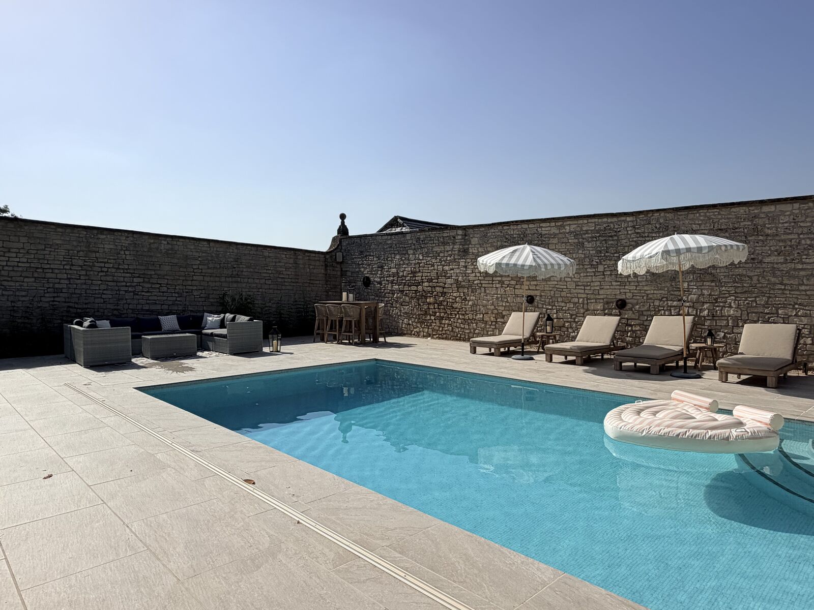 Outdoor pool with parasols